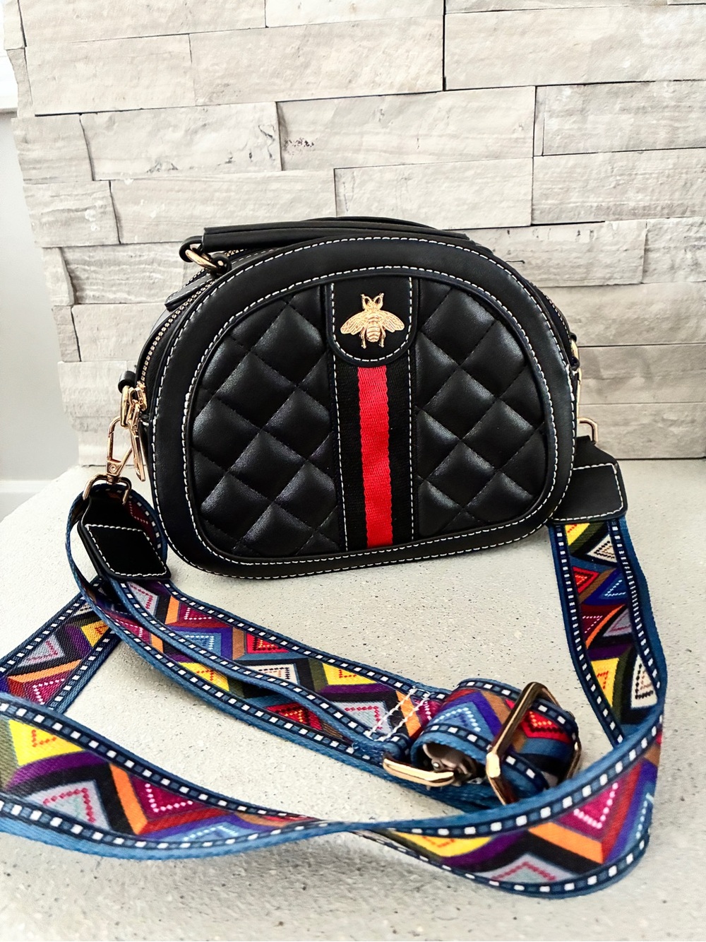Black Quilted Crossbody Bag with Red Stripe and Bee Accent